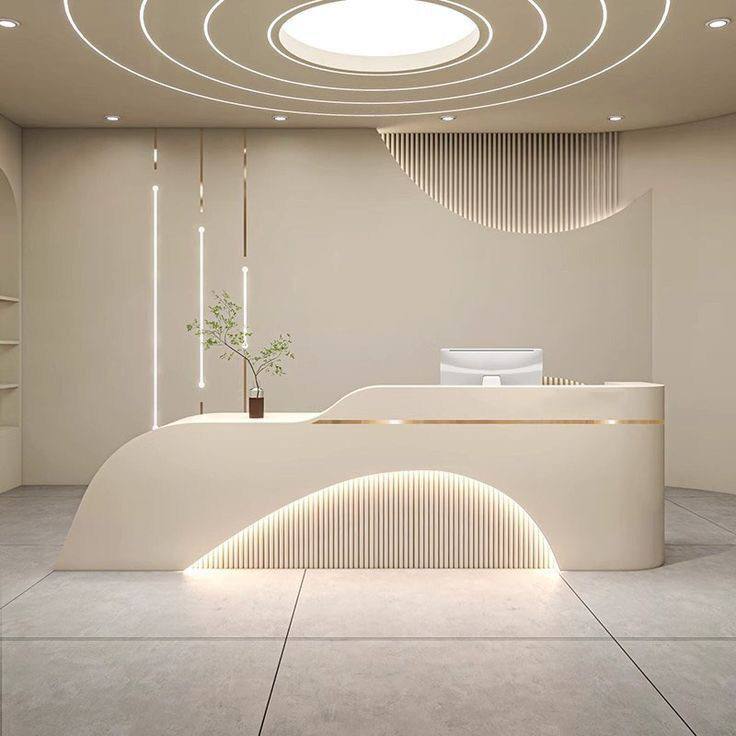 A modern, softly lit clinic reception desk with curved detailing and ambient lighting